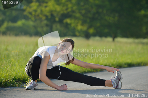 Image of woman stretching before fitness