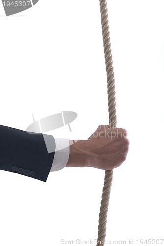 Image of business man with rope isolated on white background