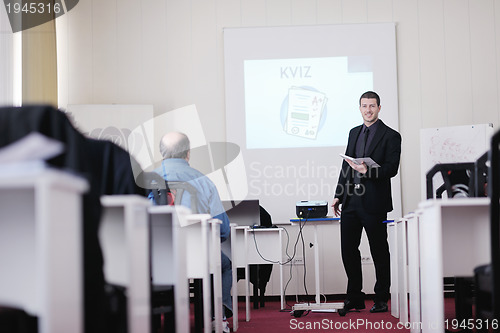 Image of business man on seminar