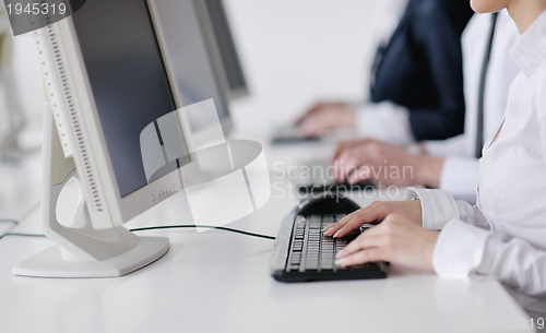 Image of business people group working in customer and help desk office