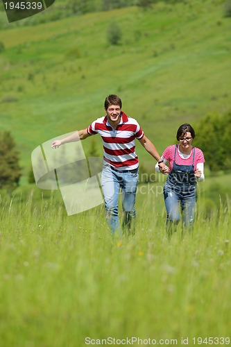 Image of romantic young couple in love together outdoor