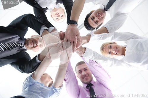 Image of business people group joining hands