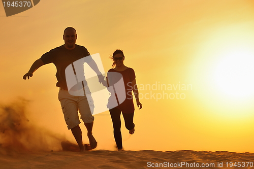 Image of couple enjoying the sunset