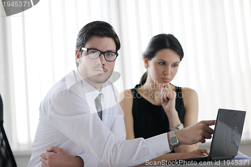 Image of business people in a meeting at office