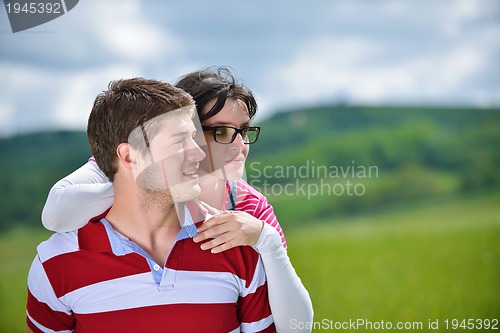 Image of romantic young couple in love together outdoor