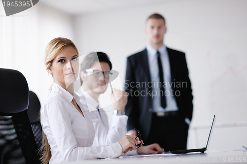 Image of business people in a meeting at office