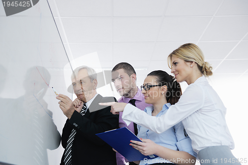 Image of Senior business man giving a presentation
