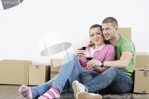 Image of Young couple moving in new home