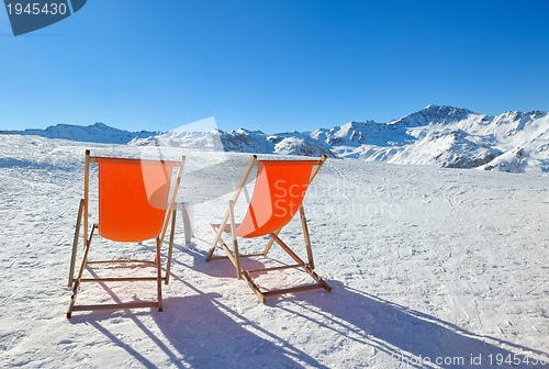 Image of wooden chair on top of mountaint