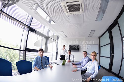 Image of business people in a meeting at office