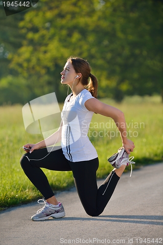 Image of woman stretching before fitness