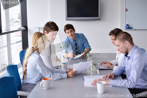 Image of business people in a meeting at office