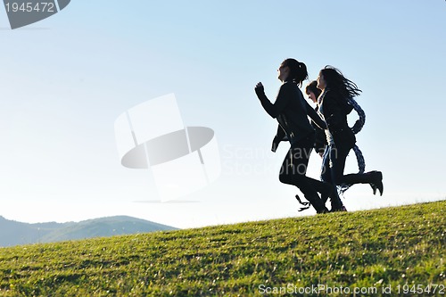 Image of group of teens have fun outdoor