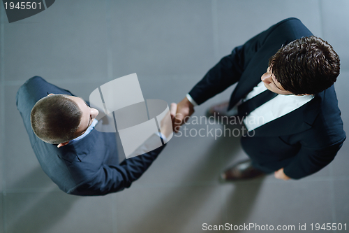 Image of business people making deal