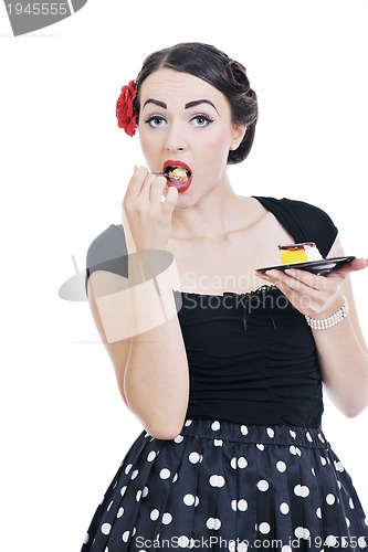 Image of beautiful young woman eat sweet cake