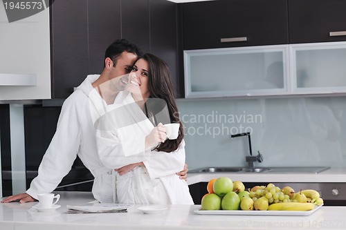 Image of young couple have fun in modern kitchen