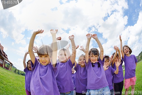 Image of happy kids group  have fun in nature