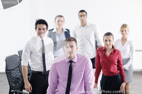 Image of young business man at meeting