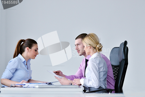 Image of Group of young business people at meeting