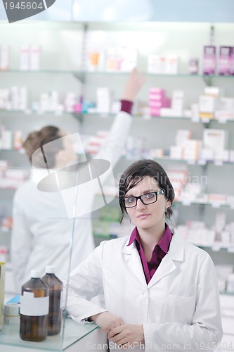 Image of team of pharmacist chemist woman  in pharmacy drugstore