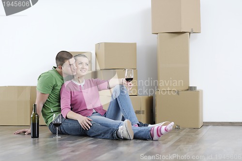 Image of Young couple moving in new home