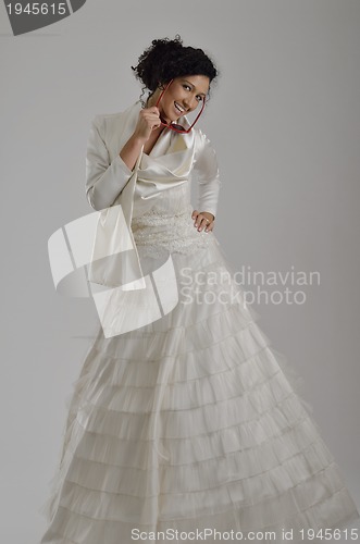 Image of Portrait of a beautiful woman dressed as a bride