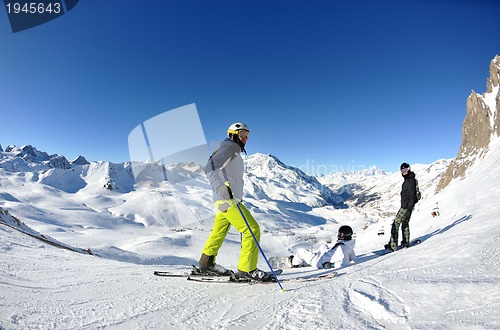 Image of winter portrait of friends at skiing