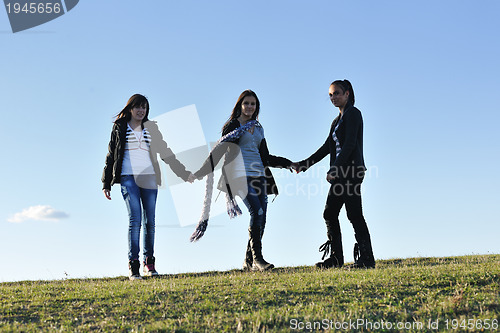 Image of group of teens have fun outdoor