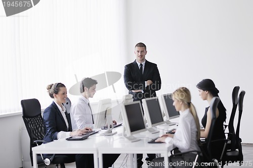 Image of business people group working in customer and help desk office