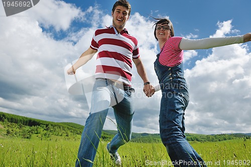 Image of romantic young couple in love together outdoor