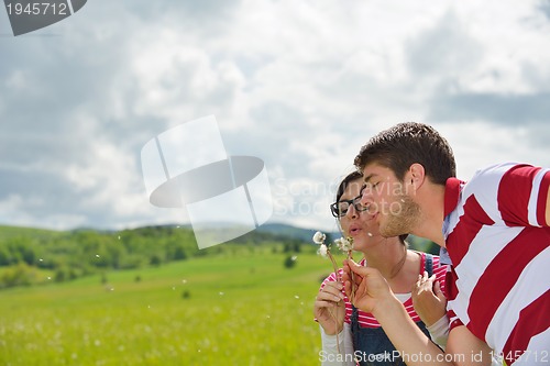 Image of romantic young couple in love together outdoor