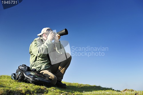 Image of Nature photographer with digital camera