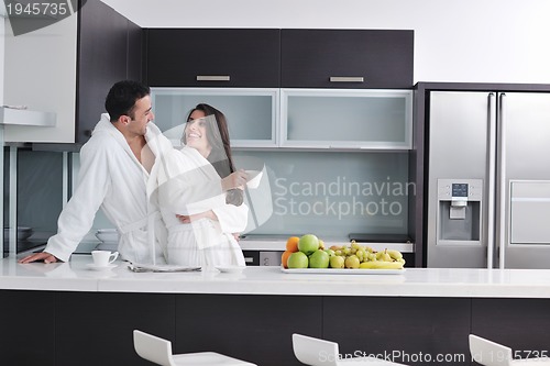 Image of young couple have fun in modern kitchen