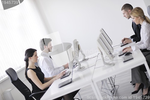 Image of business people group working in customer and help desk office