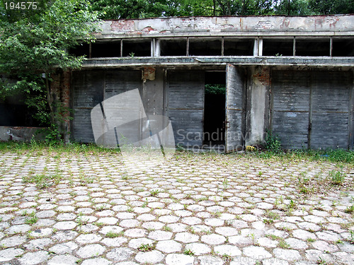 Image of Empty crumbling industrial warehouse