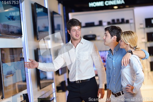 Image of people buy  in consumer electronics store