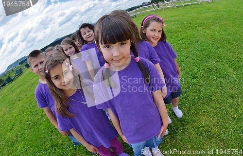 Image of happy kids group  have fun in nature