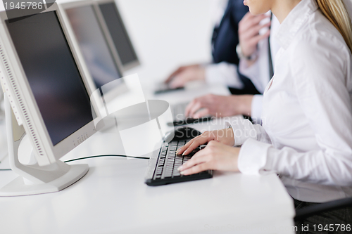 Image of business people group working in customer and helpdesk office