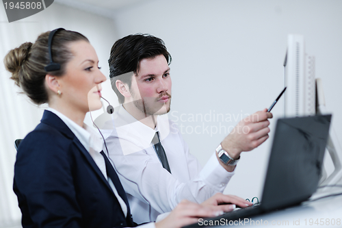 Image of business people group working in customer and help desk office