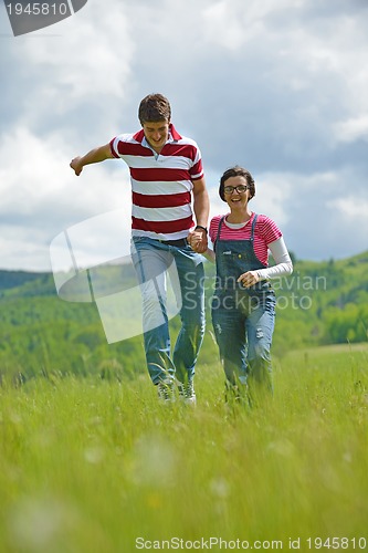 Image of romantic young couple in love together outdoor