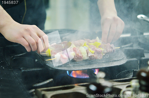 Image of chef preparing meal
