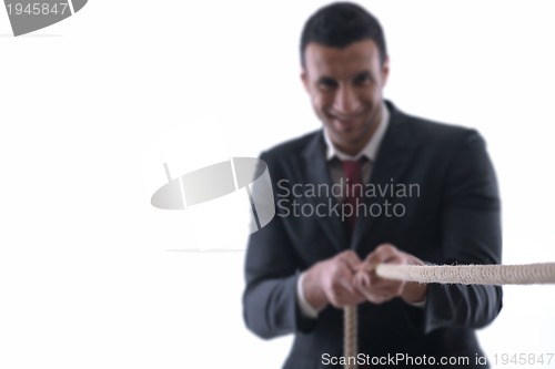 Image of business man with rope isolated on white background