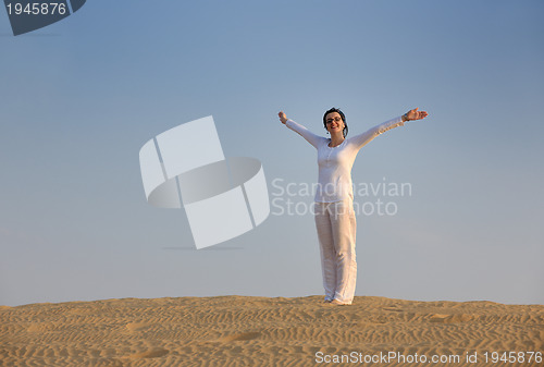 Image of woman relax in desert