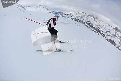 Image of skiing on fresh snow at winter season at beautiful sunny day