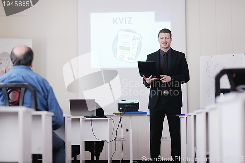 Image of business man on seminar