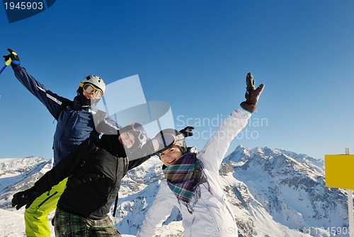 Image of winter portrait of friends at skiing