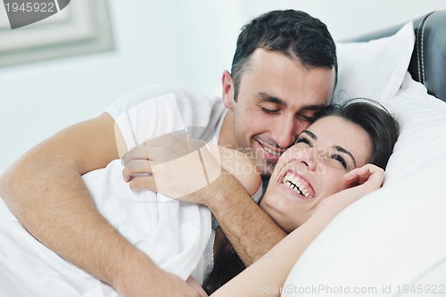 Image of young couple have good time in their bedroom