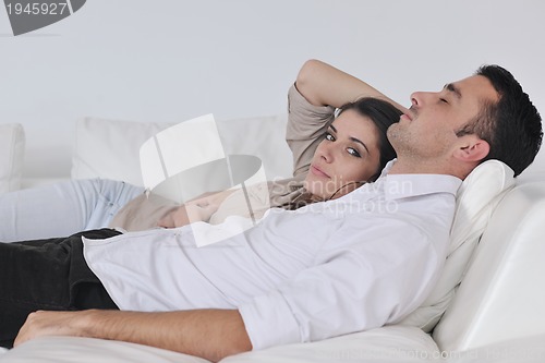 Image of happy young couple relax at home
