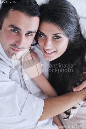 Image of happy young couple relax at home