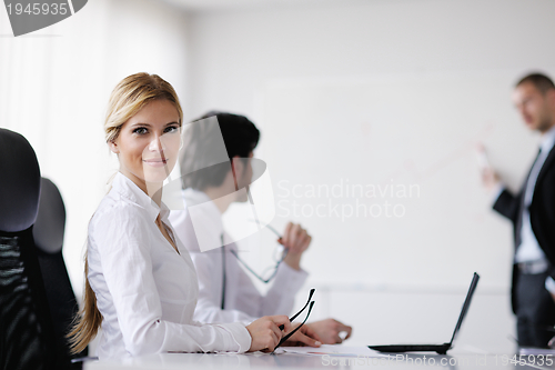 Image of business people in a meeting at office